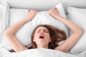 woman lying in bed