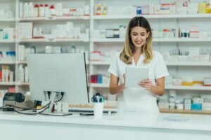 portrait of a beautiful female pharmacist working in a pharmacy.jpg